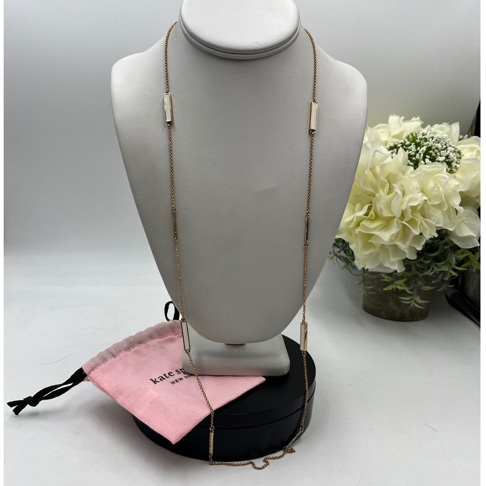 Kate Spade "Raising the Bar' white enamel rhinestone station Pave Bar necklace